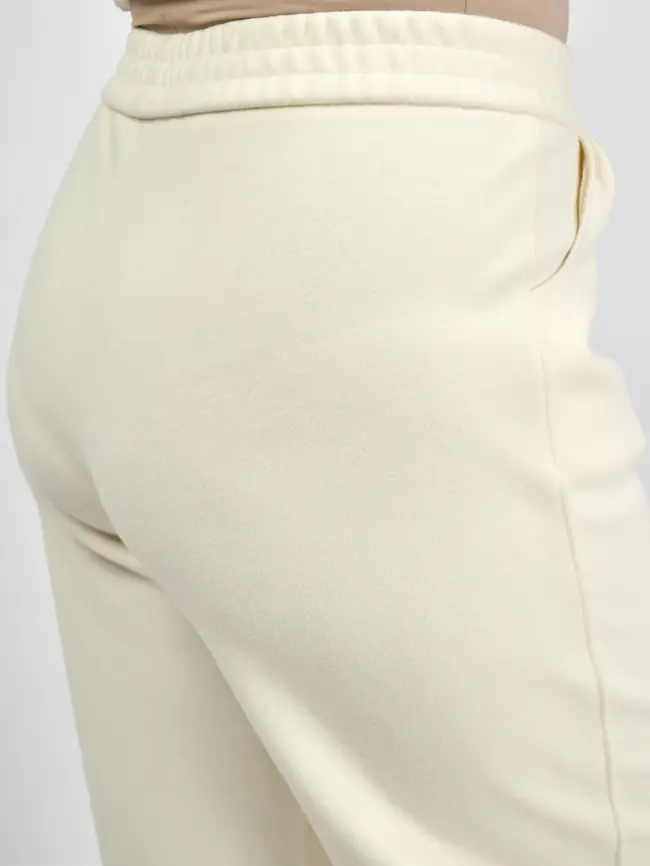 Брюки с защипами 