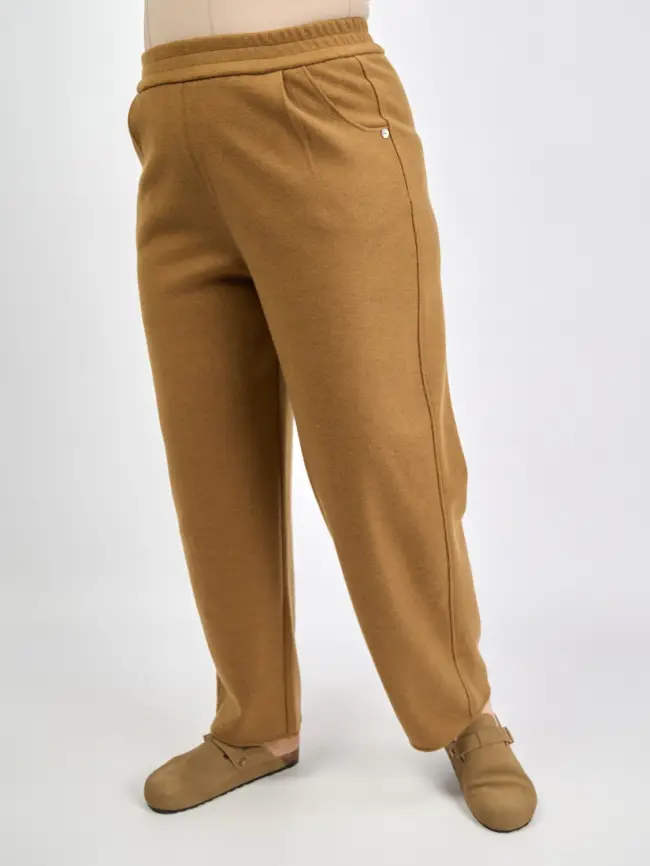 Брюки с защипами 