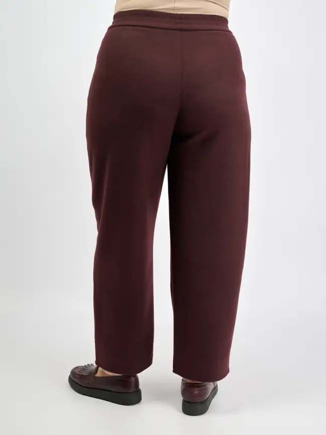 Брюки с защипами 