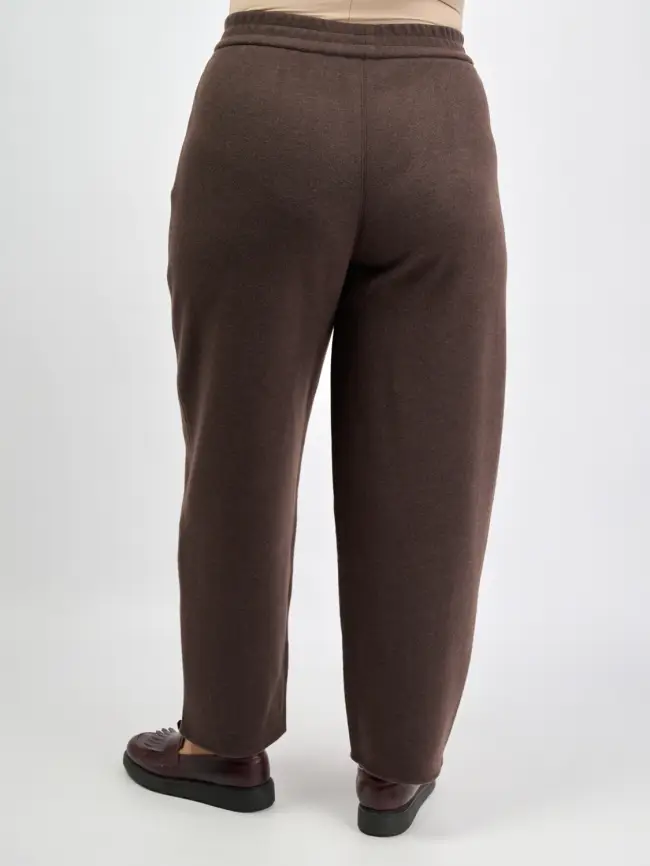 Брюки с защипами 