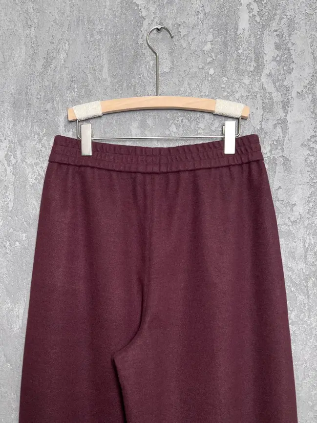 Брюки с защипами 