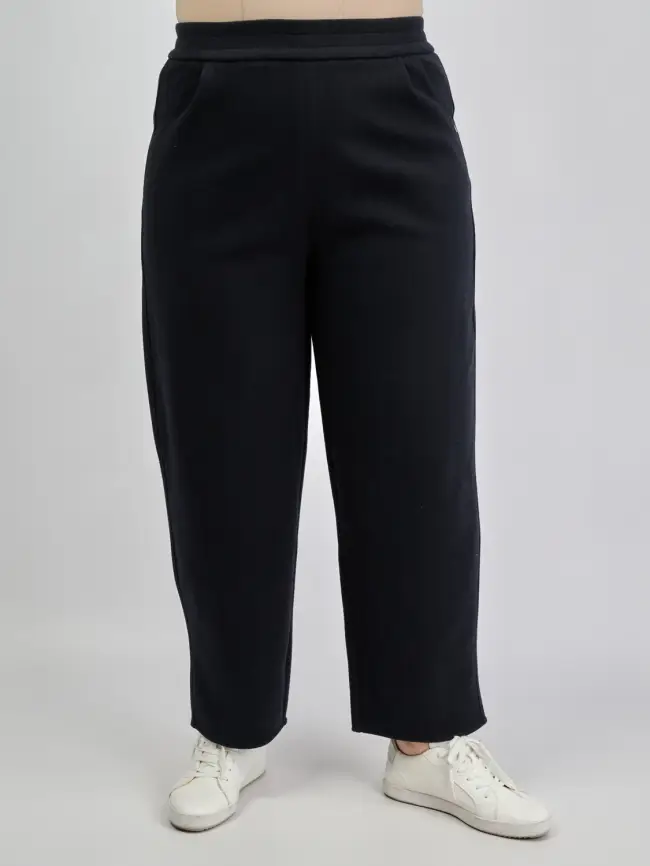 Брюки с защипами 