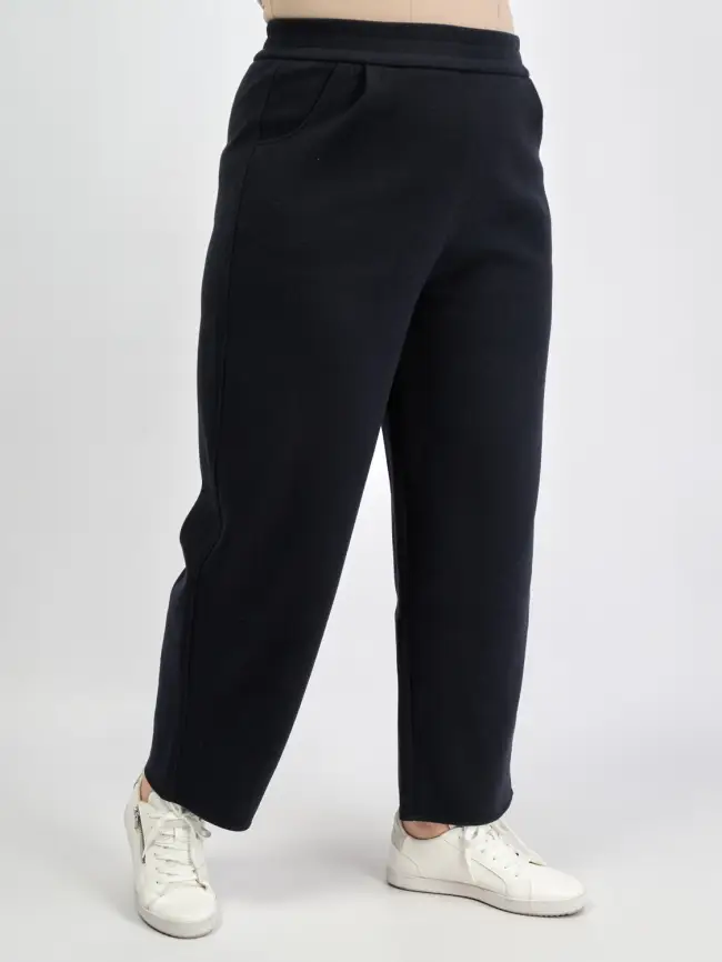 Брюки с защипами 