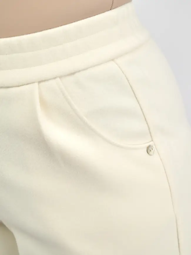 Брюки с защипами 