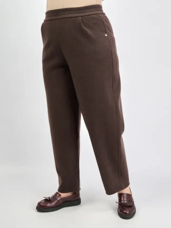 Брюки с защипами 