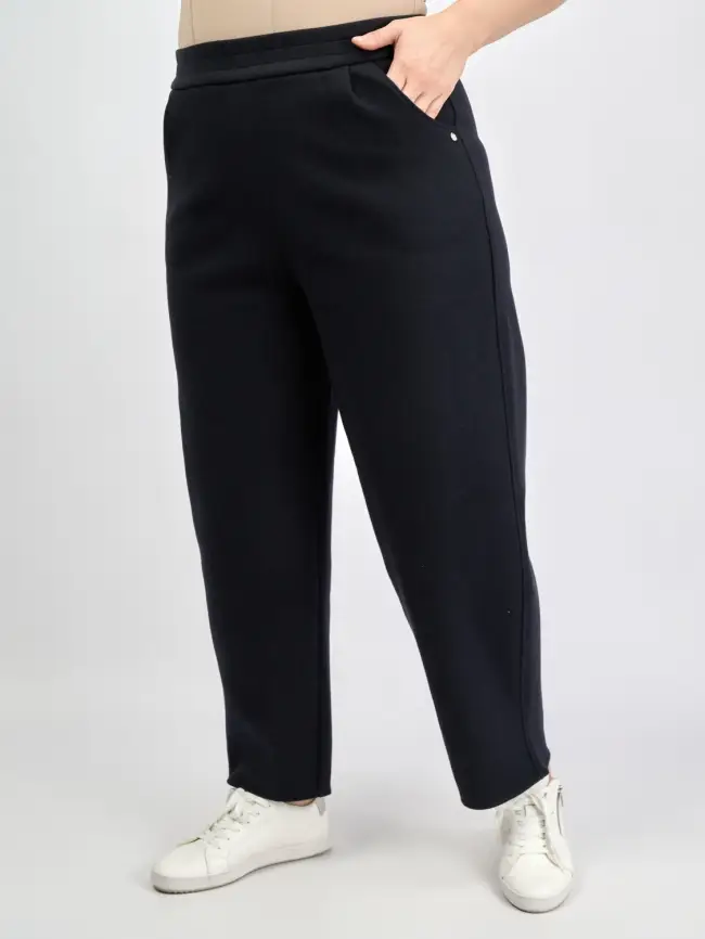 Брюки с защипами 