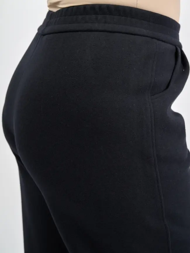 Брюки с защипами 